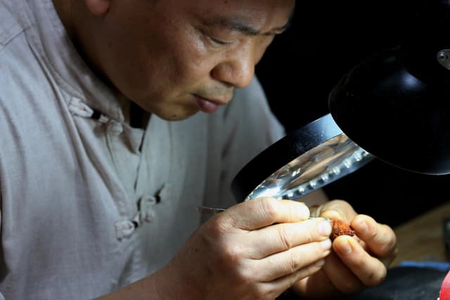 Olive pit carving.jpg Olive pit carving.jpg