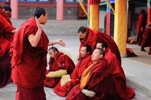 Watch Monks Debate Sutras.jpg